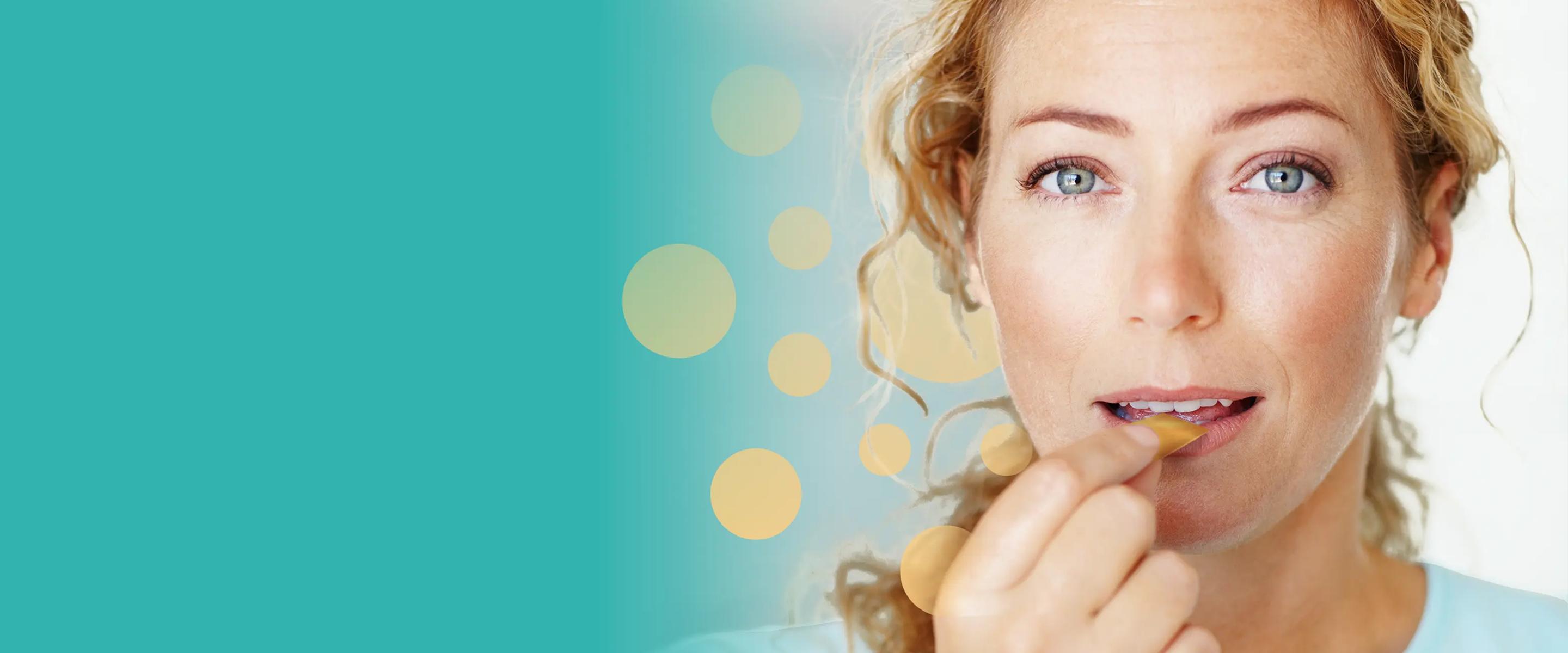 A blonde woman placing an oral dissolving strip in her mouth, with a teal background and yellow bokeh effects.