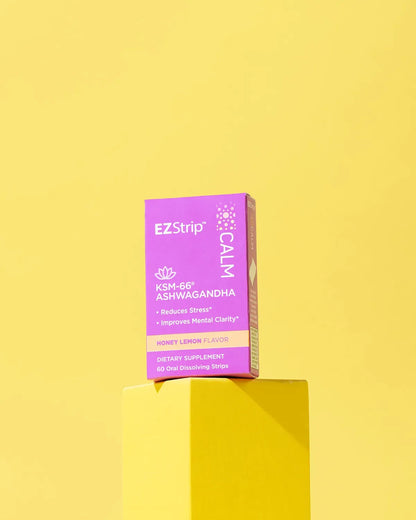 A purple EZStrip Calm supplement box in a similar yellow backdrop, emphasizing stress relief benefits.