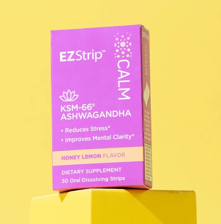 EZStrip Calm dietary supplement with KSM-66 Ashwagandha, shown on a matching yellow platform and backdrop, clearly presenting benefits such as stress reduction and mental clarity.